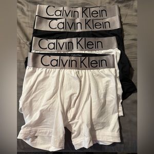Offering 4 boxer briefs, brand-name is Calvin Klein. They are all size small.